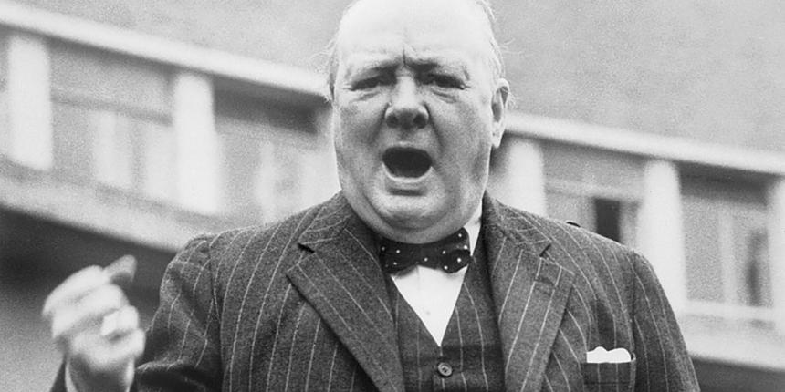 This image has an empty alt attribute; its file name is 900px-winston_churchill_during_the_general_election_campaign_in_1945_hu55965-min.jpeg